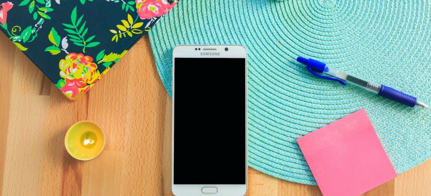 white phone on the table